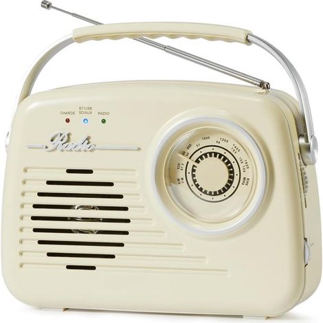 Radio portatile del 1965, alimentata a rete o a batterie, di colore beige. (1/5)