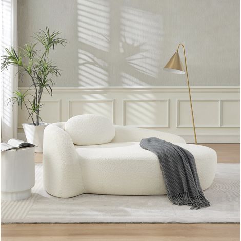 Canapé beige en tissu Teddy avec design arrondi et coussin d’appui-tête (1/5)