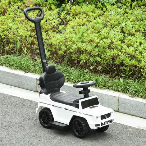 Voiture électrique pour enfants, entièrement équipée, 12-36 mois, avec klaxon, repose-pieds, barres de sécurité et pare-soleil, blanche (1/5)