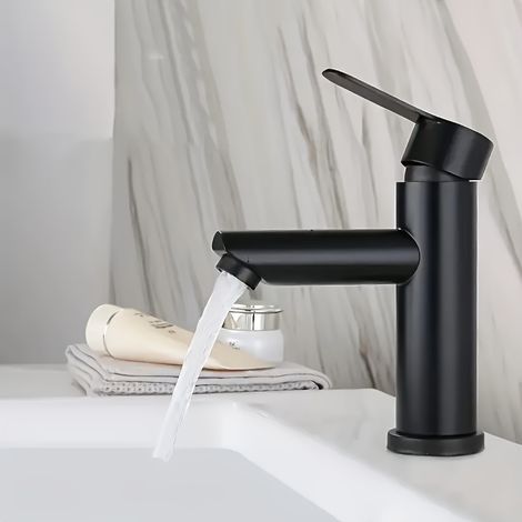 Ein eleganter, schwarzer Edelstahl-Waschtischhahn für Warm- und Kaltwasser, auch für die Küche geeignet (kein Wasseranschluss erforderlich). (1/5)