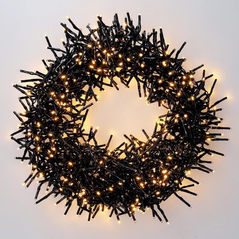 Guirnalda de bombillas LED mini de 10m con 1000 bombillas y 8 funciones (1,3W 3000K) IP44 fabricada en PVC color negro (1/5)