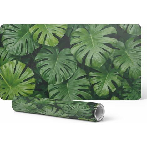Alfombrilla protectora de vinilo para el lugar de trabajo con dise帽o de hojas de monstera, 90x45 cm.