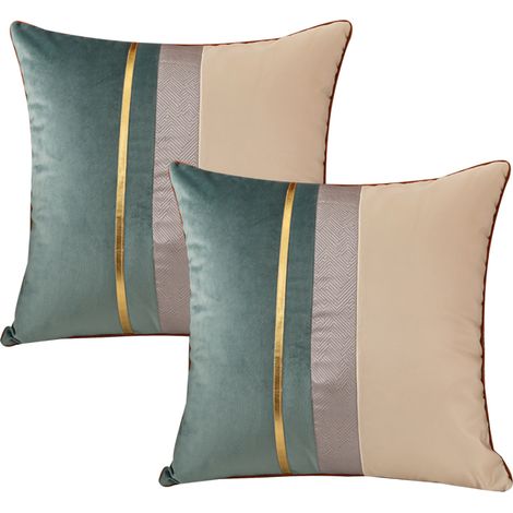 Housse de coussin patchwork bleu marine avec taie d'oreiller à rayures dorées, style moderne et luxueux (1/5)