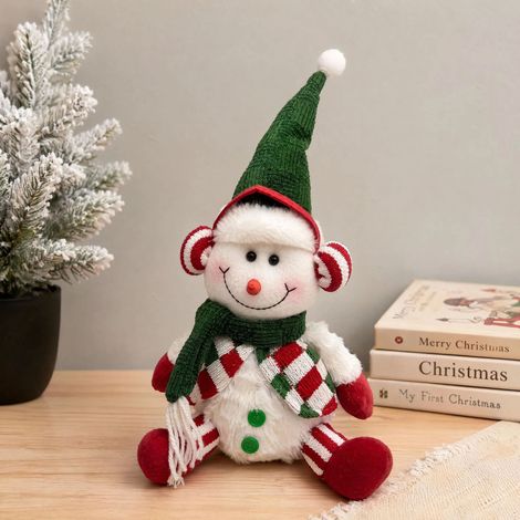 Weihnachtsdekoration: Sitzende Puppe, grün karierte Stoffpuppe „Schneemann“ als Tischdekoration