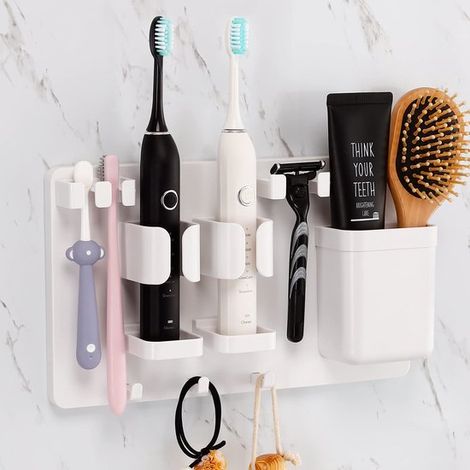 Soporte autoadhesivo impermeable para cepillos de dientes eléctricos, y para guardar cepillos y pasta de dientes (1/5)
