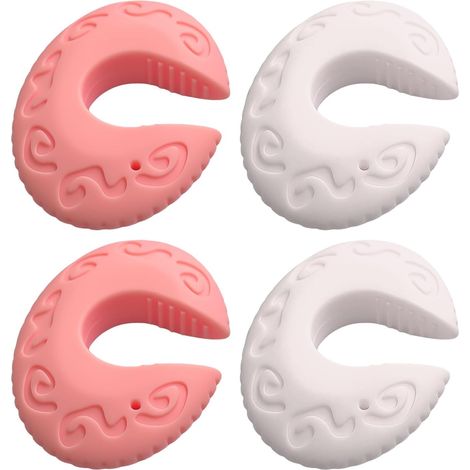 A pair of pink and white silicone door clips, home decor, child finger protectors and safety accessories. (1/5)
