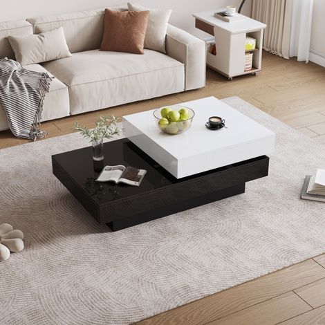 Table basse pivotante coutures noir et blanc,finition haute brillance. Double couche en panneau compressé,adaptée aux appartements. (1/5)