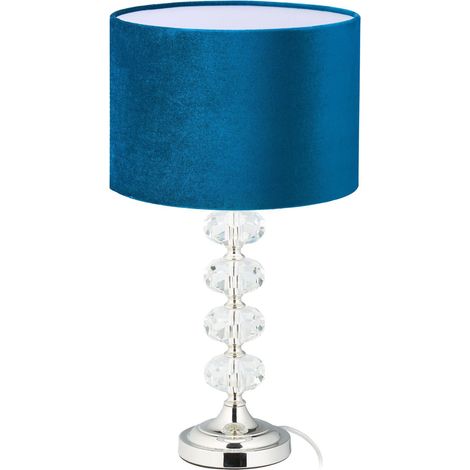 Lámpara de mesa en cristal y terciopelo azul.