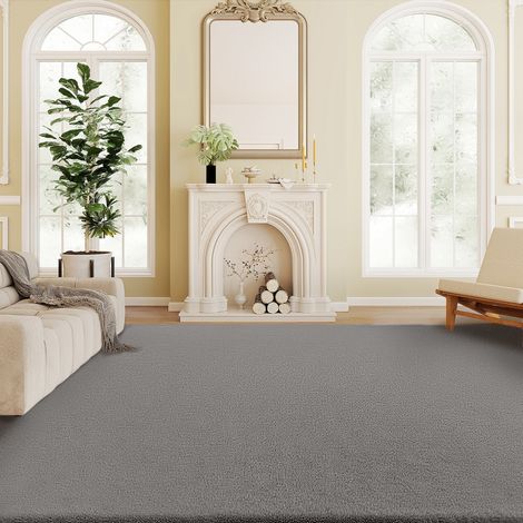 Tapis à poils longs gris clair lavable en machine antidérapant fausse fourrure 200 x 140 cm