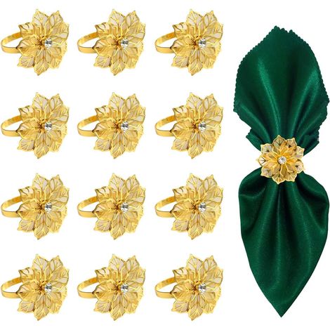 Ensemble de 12 ronds de serviette dorés, ornés de ronds de serviette ajourés en forme de fleur. (1/5)