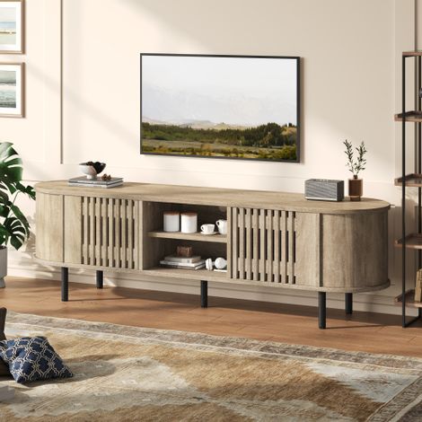 Meuble TV / Meuble bas (avec compartiment de rangement à double porte) — Unité de rangement pour salon, au design en bois ajouré — Banc TV aux tons bois naturel, reposant sur 5 pieds — Adapté aux télé