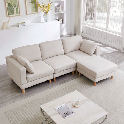 Divano angolare 235x152x78 cm beige in poliestere con pouf modulare e chaise longue reversibile (1/5)