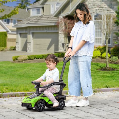 Voiture électrique pour enfant avec barre de poussée, véhicule 2 en 1 avec volant, klaxon, repose-pieds et rangement sous le siège, verte (1/5)