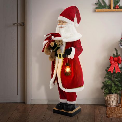 ECD Germany Figura Realistica di Babbo Natale 120 cm con Luci LED e Musica, Statua Grande con Orsetto Sensore di Movimento e Lanterna, Decorazione Natalizia Musicale, Figurina Festiva per Interni (1/5)