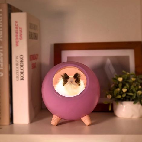 Lámpara de noche infantil morada con un hámster durmiendo. (1/5)