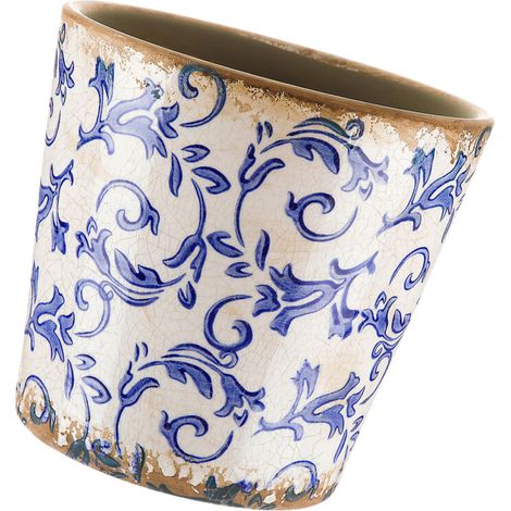 Il foro di drenaggio del vaso di fiori in ceramica blu