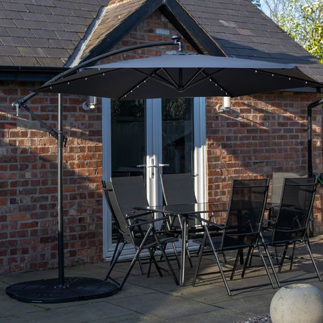 Outdoor 6 Person Rectangular Glass Top Garden Dining Table Chairs With Black Banana Lit Parasol and Base Set (1/5)