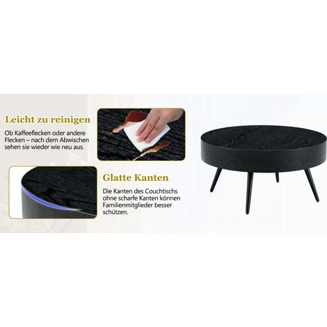 Table basse ronde de 70 cm de diamètre, en MDF aspect bois noir et pieds en métal noir. Design minimaliste, idéal pour les salons et les petits espaces. (1/5)