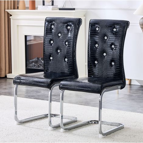 Set de 2 sillas de comedor retro en PVC negro con detalles de cristal y patas cromadas (1/5)