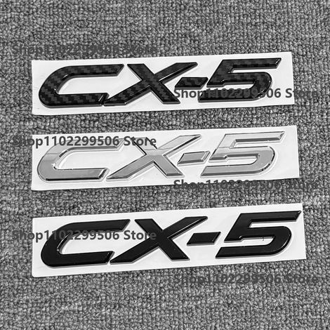 (17-21CX5, noir) - Accessoires extérieurs en ABS noir argenté effet carbone pour voiture Mazda. Convient aux voitures Mazda. Étiquette, logo et lettrage autocollant pour coffre. (1/5)