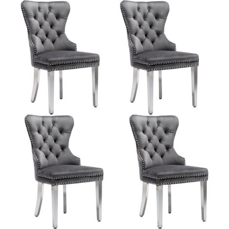 Chaises de salle à manger (Adaptées à la cuisine ou au salon  Détail unique d'anneau au dossier  Lot de 4) — Sièges rembourrés avec finition cloutée et pieds en métal  tissu velours — Gris. (1/4)
