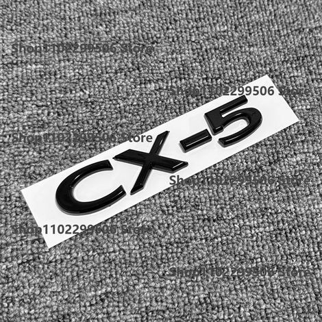 (22-25CX5, carbone) - Accessoires extérieurs en ABS noir argenté pour voiture Mazda : autocollant logo/lettre pour coffre. (1/5)