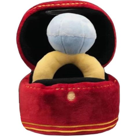 Un jouet pour chien en peluche en forme d'anneau qui couine, un jouet à mâcher doux qui peut être utilisé pour masser les dents. (1/5)