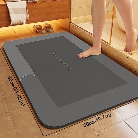Tapis de sol anti-fatigue gris, grand format, rembourré, pour cuisine, bureau et salle de bain, design ergonomique pour un confort optimal. (1/4)