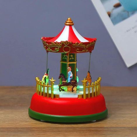 JSSEVN - Adorno navideño genérico de carrusel luminoso, mini noria con caja de música y luces LED para decoración navideña de oficina. Regalo ideal. (1/5)