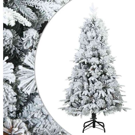 Sapin de Noël artificiel aux branches flexibles et recouvert de neige. (1/5)