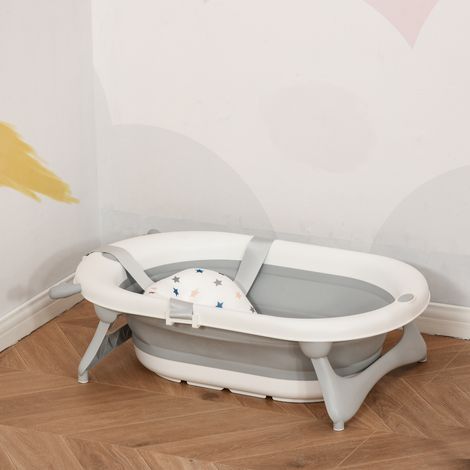 Vaschetta da bagno pieghevole per neonati fino a 3 anni, 81,5x50,5x23,5 cm con tappo termosensibile e cuscino grigio.