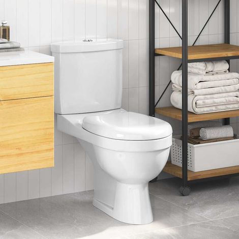 Toilettes blanches avec réservoir