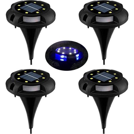 Luces solares para césped: 4 focos LED impermeables IP65, luz blanca natural + azul, batería integrada, ideales para jardines, patios y entradas de vehículos.
