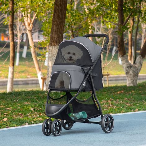 Poussette pliable pour chiens, chats et autres petits animaux. Comprend deux laisses, des roues en EVA, un guidon réglable et un panier. Dimensions : 83 x 55 x 101 cm, grise. (1/5)