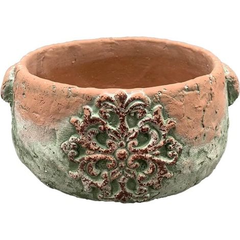 Maceta ovalada rústica de hormigón con adorno para jardín.