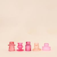 Set de 5 bougeoirs en verre rose assortis