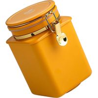 Boîte de rangement hermétique en acier inoxydable orange pour café moulu et en grains.