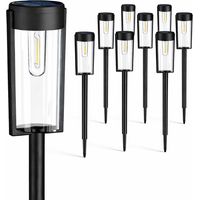 set of 8 round warm white LED solar garden lights, suitable for landscaping.