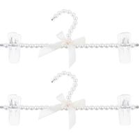 Lot de 2 cintres pour pantalons et vêtements, ornés de perles.
