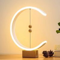 Lampe de table moderne en bois avec interrupteur à flotteur magnétique.