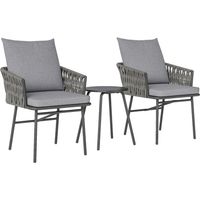 Ensemble trois pièces rotin table et chaises deux chaises une table basse coussins amovibles