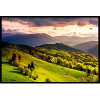 Affiche encadrée paysage vallonné au coucher du soleil