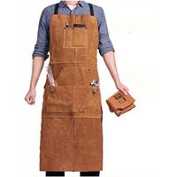 Tablier en cuir - tablier de soudage en cuir avec 6 poches à outils, tablier de travail ignifuge et résistant à la chaleur avec bretelles croisées réglables parfait pour les forgerons, les mécaniciens