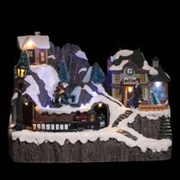Villaggio illuminato con stazione e pattinatori 9 LED l.23cm musicale - Feeric lights & christmas