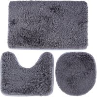 Set di 3 tappetini da bagno grigi.