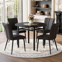 Table ronde minimaliste 100cm avec 4 fauteuils PU noirs pieds métal noir adaptée salon