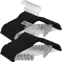 Perchas para pantalones, faldas, vestidos, chaquetas y abrigos - Juego de 24 perchas antideslizantes con pinzas retráctiles, superficie de terciopelo, gancho giratorio de 360°, color negro