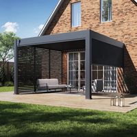 M&S – Pergola bioclimatique adossée 4x4M – Aluminium anthracite – Système de drainage intégré – Résistance au vent jusqu'à 100 km/h