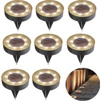 Lot de 8 lampes solaires de jardin LED étanches IP68, blanc chaud, pour une utilisation extérieure.