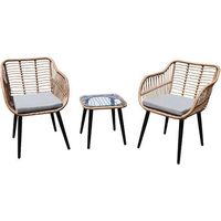 Salon de jardin en rotin composé de chaises et d'une table avec plateau en verre